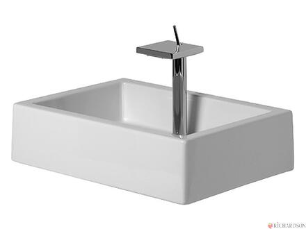 STARCK X - Lavabo comprenant trop-plein, plage de robinetterie, fixation et bonde avec enjoliveur en céramique